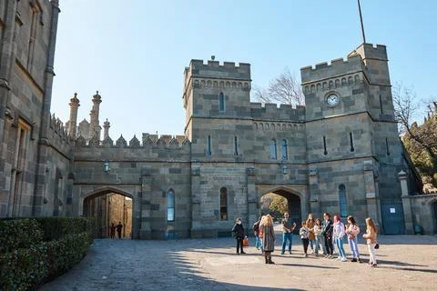 Excursion to the medieval castle, the palace, the stone road, the courtyard in Stock Photos