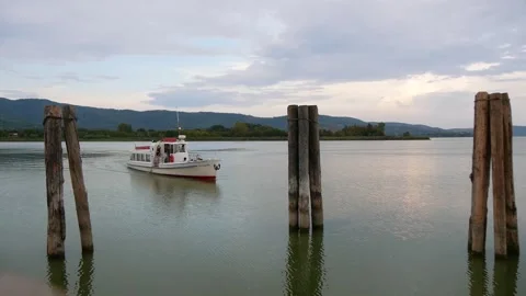 Excursion Motor Boat Arrives at the Pier on the Lake Trasimeno, Italy Stock Footage 244815637