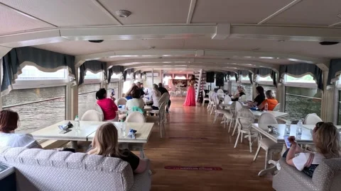 Excursion on a motor ship, ship, with live music, violin, performance Stock Footage 249892423
