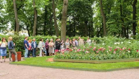 Excursion in the Red Garden. Stock Photos