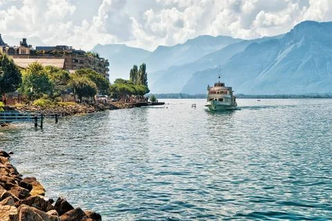Excursion ship with people aboard on Geneva Lake at Montreux Stock Photos