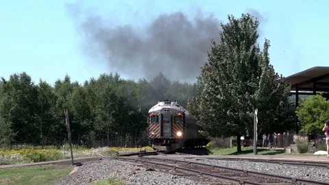 Excursion Train crossing roadway Stock Footage 125092136