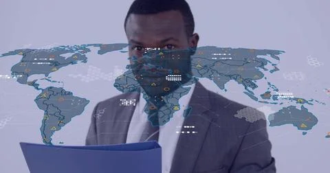Exec scanning blue folder, causing global map overlay growing data icons, Stockfoto's