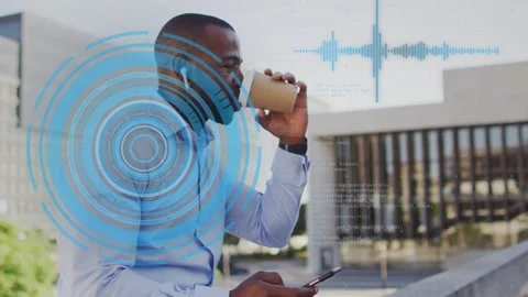 Exec tapping phone sipping coffee on plaza making blue waveform and code overlay Stock Footage 333838058