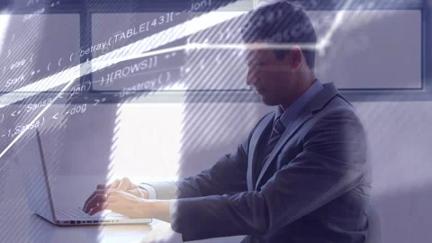 Exec typing on laptop scanning screen, causing animated charts and code Stock Footage 334703558