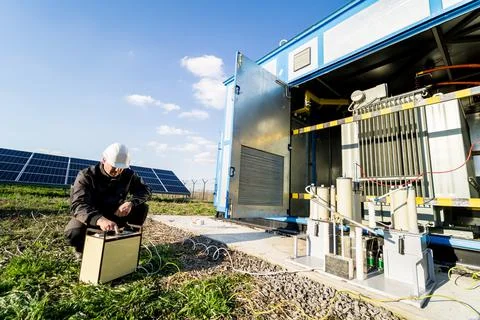 Execution of electrical measuring works on the power transformer Stock Photos
