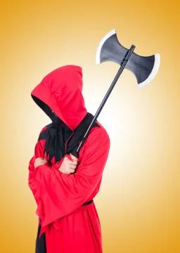 Executioner in red costume with axe on white Stock Photos