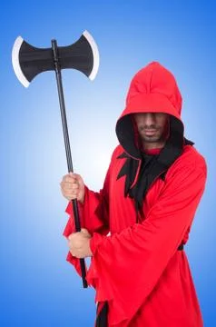 Executioner in red costume with axe on white Stock Photos