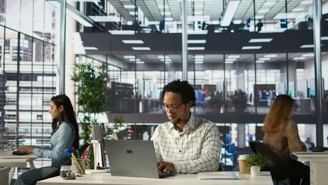 Executive assistant at a multinational company work on next big business project Stock Photos