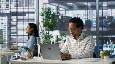 Executive assistant at a multinational company work on next big business project Stock Photos