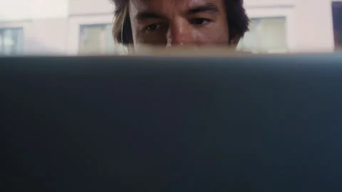 Executive Behind Laptop in Bright Workspace Stock Footage 313340472