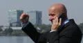 Executive Business Man Receives Mobile Phone Excitement Positive Good News 4k or 4k+ Resolution