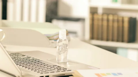 Executive cleaning hands avoiding infection at office Video stock 127156719