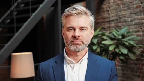 Executive face satisfied with good job career posing in modern office. Stock Footage 232471697