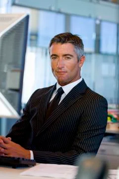 Executive facing computer Stock Photos