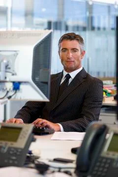 Executive facing computer Stock Photos