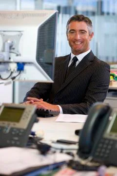 Executive facing computer Stock Photos
