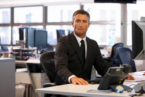 Executive facing computer Stock Photos