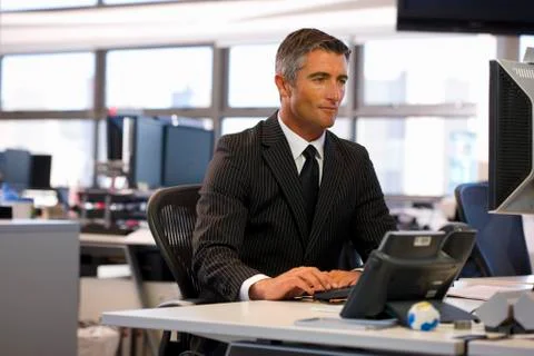 Executive facing computer Stock Photos