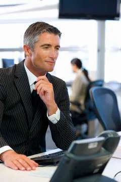 Executive facing computer Foto stock