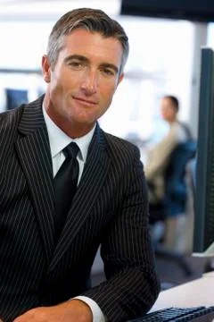 Executive facing computer Stock Photos