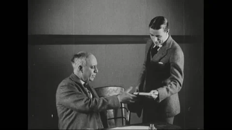 Executive handing over envelope Stock Footage 43320758