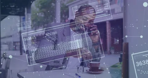 Executive handling call at cafe, holding phone, stirring cup while call Stock Footage 330741515