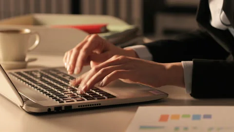 Executive hands typing on laptop at night at office Video stock 127152093