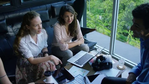 Executive having a discussion with colleagues Stock Footage 75453194