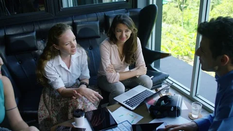 Executive having a discussion with colleagues Stock Footage 75453204