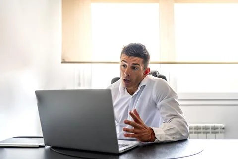 Executive having a video call while working from home Stock Photos