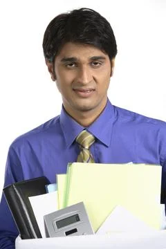 Executive holding box containing office material MR#687M Stock Photos