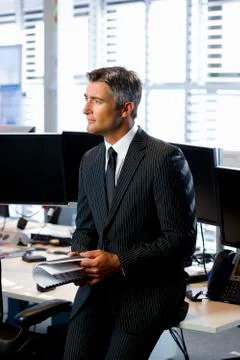 Executive holding documents Stock Photos