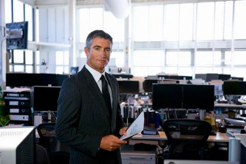 Executive holding documents Stock Photos