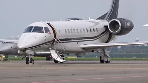 Executive Jet Parked at General aviation terminal Video stock 237857438