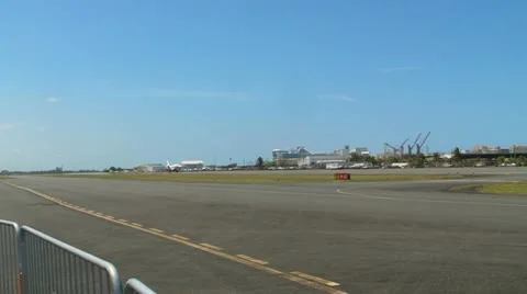 Executive jet taking off leaving tropical island side view Stock Footage 10833410