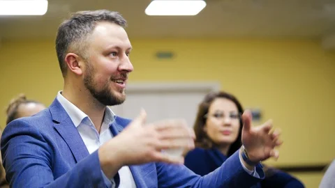 Executive leader explaining the main rules of successful business gesticulating  Stock Footage 108580268