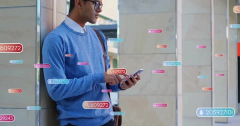 Executive leaning on pillar tapping smartphone reviewing tags bell icons Stock Footage 313295204