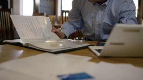 Executive making an online payment in restaurant Stock Footage 107981782