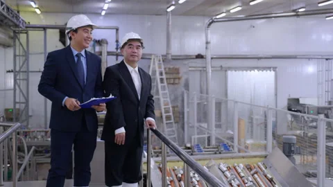 Executive manager and engineer inspecting food processing factory, business.. Stock Footage 319456363