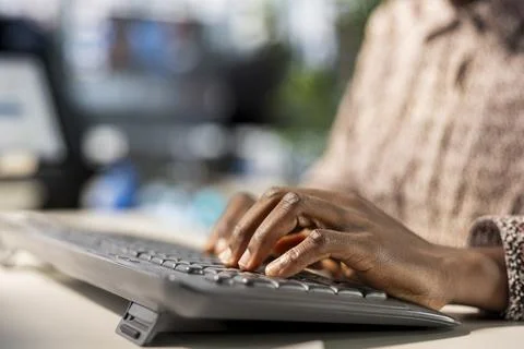 Executive manager in modern office engaged in infographics analysis Stock Photos