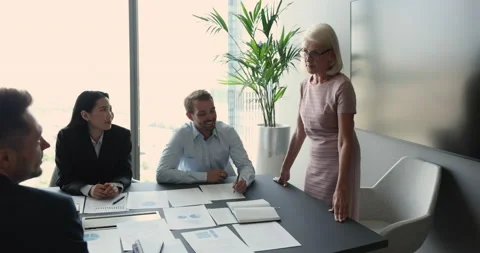 Executive manager with staff develops strategy take part in seminar 動画素材 234055076