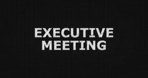 EXECUTIVE MEETING text on board Ilustración de archivo