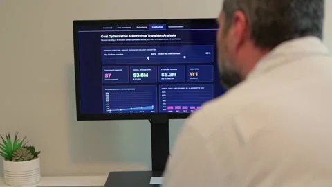Executive Reviewing AI Workforce Automation Data Stock Footage 333419027