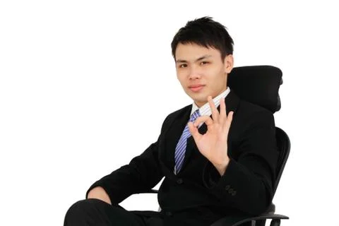 Executive showing ok sign Stock Photos