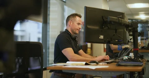 Executive working on a computer in his office Stock Footage 112028237