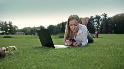 Executive working with mobile phone outdoor Stock Footage 67697822
