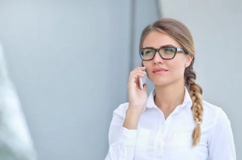Executive working with a mobile phone Stock Photos