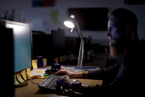 Executive working on personal computer at desk Foto stock
