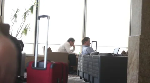 Executives in Airport Lounge Stock Footage 1049189